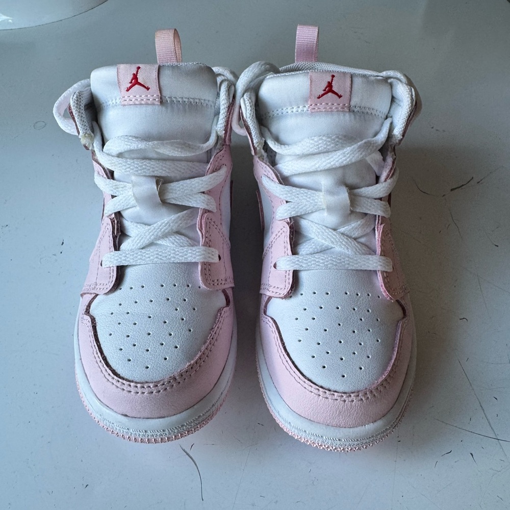 Jordan Pink and White High-Top Sneakers